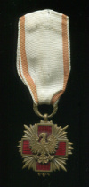 Почетный знак «Польского Красного Креста» II степени.